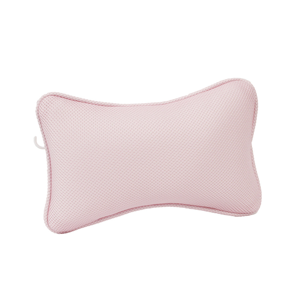 Bath pillow in use in tub
